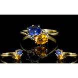 Ladies 18ct Gold Attractive Two Stone Sapphire and Diamond Dress Ring the blue sapphire and orange/