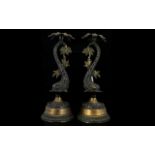 A Pair Of French Style Lamp Bases Each in the form of a stylised dolphin,