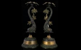 A Pair Of French Style Lamp Bases Each in the form of a stylised dolphin,