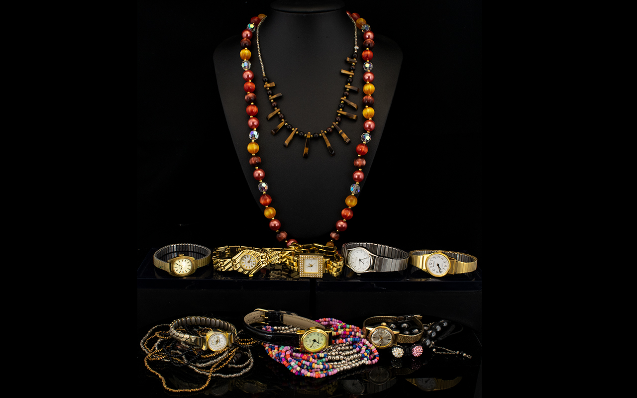 A Mixed Collection Of Costume Jewellery And Watches A varied lot to include seed bead bracelet,