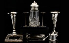 A Small Mixed Lot Of Silver Items To include two trumpet form spill vases, dated Birmingham 1918,