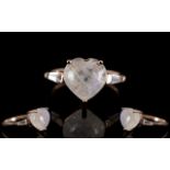 Rainbow Moonstone Heart Cut Ring, a 5ct heart cut rainbow moonstone cabochon, mined in Sri Lanka,