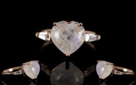 Rainbow Moonstone Heart Cut Ring, a 5ct heart cut rainbow moonstone cabochon, mined in Sri Lanka,