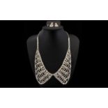 White Crystal Collar Necklace and Matching Drop Earrings, a filigree collar style necklace with