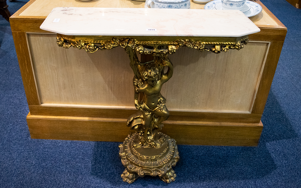 Reproduction Italian Style Figural Console Table Gilt support with putti figure and reconstituted