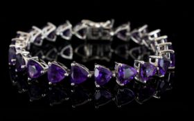 Amethyst Trillion Cut Tennis Bracelet, 22cts of rich,