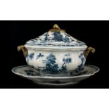 A Large Blue And White Tureen And Charger Modern ovoid form tureen with metal handles,