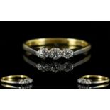 Antique Period 18ct Gold and Platinum Set 3 Stone Diamond Ring marked 18ct and platinum.