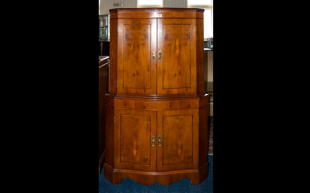 J Webster And Sons Ltd Yew Wood Drinks Cabinet Corner cabinet with serpentine front, panelled doors,