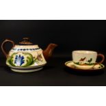 Oversized Cornish Slipware Teapot And Cup With Saucer A large teapot in traditional cream and brown