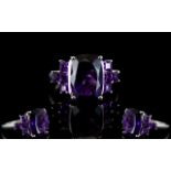 Amethyst Cushion and Square Cut Ring, an