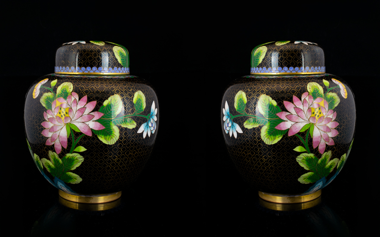 A Pair Of Oriental Cloisonne Lidded Jars