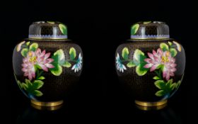 A Pair Of Oriental Cloisonne Lidded Jars