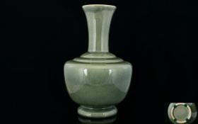 Chinese Crackle Glaze Celadon Vase With Ovoid Body And Trumpet Neck. Height 13½ Inches