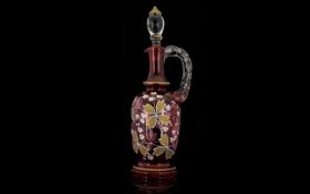 A Cranberry Glass Decanter Oil decanter of slim, elongated form with transparent frilled glass