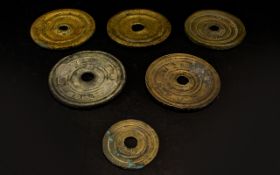 A Collection Of Six Saudi Arabian Brass Weights Late 19th /early 20th century circular hammered