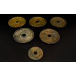 A Collection Of Six Saudi Arabian Brass Weights Late 19th /early 20th century circular hammered