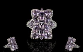 Rose de France Amethyst Rectangular Cluster Ring, a slightly shaped rectangular panel set with a