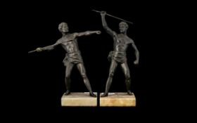 A Pair Of Spelter Figures In The Form Of Ancient Greek Gymnasts Each raised on square marble socle,