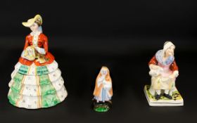 A Staffordshire Figure In The Form Of A Seated Peasant Woman Together with a German nursery rhyme