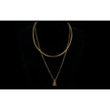 A 14ct Gold Chain And Chinese Character Pendant Set on fine link chain, the pendant stamped 14k,