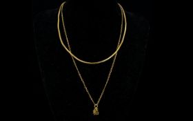 A 14ct Gold Chain And Chinese Character Pendant Set on fine link chain, the pendant stamped 14k,