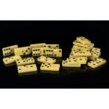 A Set Of Early 20th Century Bakelite/Cellulose Dominoes Of traditional rectangular form in cream,