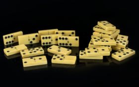 A Set Of Early 20th Century Bakelite/Cellulose Dominoes Of traditional rectangular form in cream,