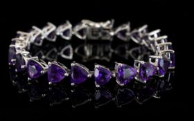 Amethyst Trillion Cut Tennis Bracelet, 22cts of rich, deep purple amethyst in the unusual trillion