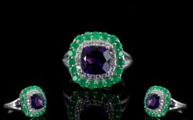 Emerald, Amethyst and White Zircon Ring, a square cushion cut, deep purple amethyst of 2cts,