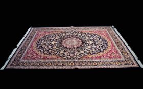 A Very Large Woven Silk Carpet Keshan rug with cobalt blue ground and traditional Middle Eastern