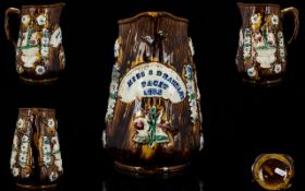 Measham Bargeware Treacle Glaze Jug with Extensive Applied Floral Decoration to Body and the Words -