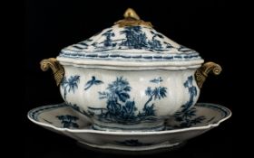 A Large Blue And White Tureen And Charger Modern ovoid form tureen with metal handles, the whole