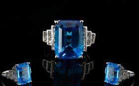 Large Swiss Blue Topaz and White Topaz Statement Ring, a 15ct octagon cut Swiss Blue topaz solitaire