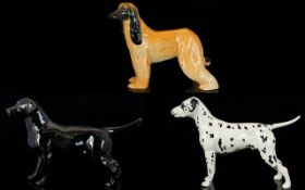 Three Beswick Ceramic Dog Figures Each in very good condition,