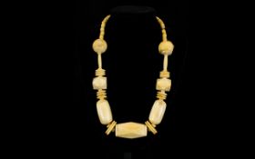 African Tribal Art Heavy and Large Late 19th Century Carved Ivory Necklace. Measures 24 Inches -