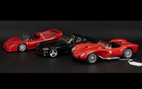 A Collection of Burago Model Cars ( 3 ) In Total.