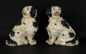 A Pair Of Staffordshire Dog Figures Two spaniel figures,