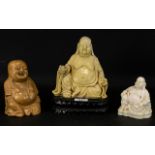 A Collection Of Modern Buddha Figures The tallest, 8 inches, comprising two resin figures,