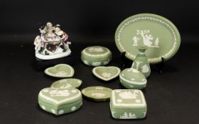 A Mixed Collection Of Wedgwood Green Jasperware To include, trinket dishes, trinket trays, bud vase,