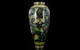 An Early 20th Century Japanese Cloisonne Vase Of slender ovoid form, depicting birds of paradise,