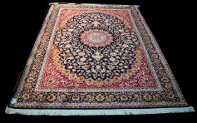 A Very Large Woven Silk Carpet Keshan rug with midnight blue ground and traditional Middle Eastern