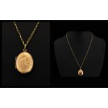 Oval Shaped - 9ct Gold Hinged Locket - Attached to a 9ct Gold Belcher Chain ( Small Links ) Both