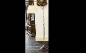 Antique Style Standard Lamp Adjustable floor standing lamp raised on circular wood effect base with