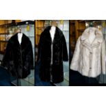 A Collection Of Three Vintage Simulated Fur Coats Each in good condition, each in plush faux fur.