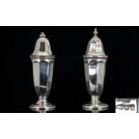 Art Deco Period Pair of Silver Salt and Pepper Pots of Tapered Form.