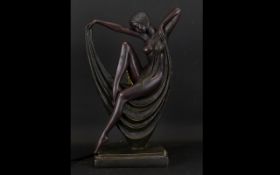 A Reproduction Art Deco Figural Table Lamp Bronzed effect resin lamp, dated, C.