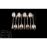 A Small Collection Of Silver Spoons And Sugar Tongs Twelve items in total, various hallmarks,