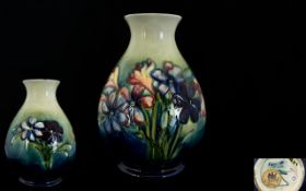 William Moorcroft Signed Bulbous Shaped Vase ' Spring Flowers ' Pattern. c.1930's.