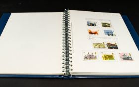 Stamp Interest Blue A4 Multi Ring Stamp Album with largely complete set of GB stamps from 1971 to